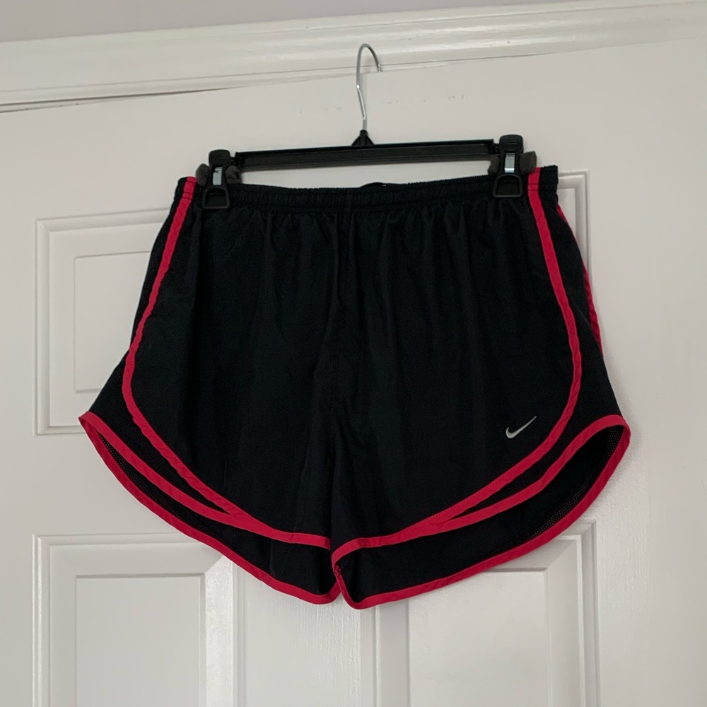 Black Nike running shorts with pink trimming
